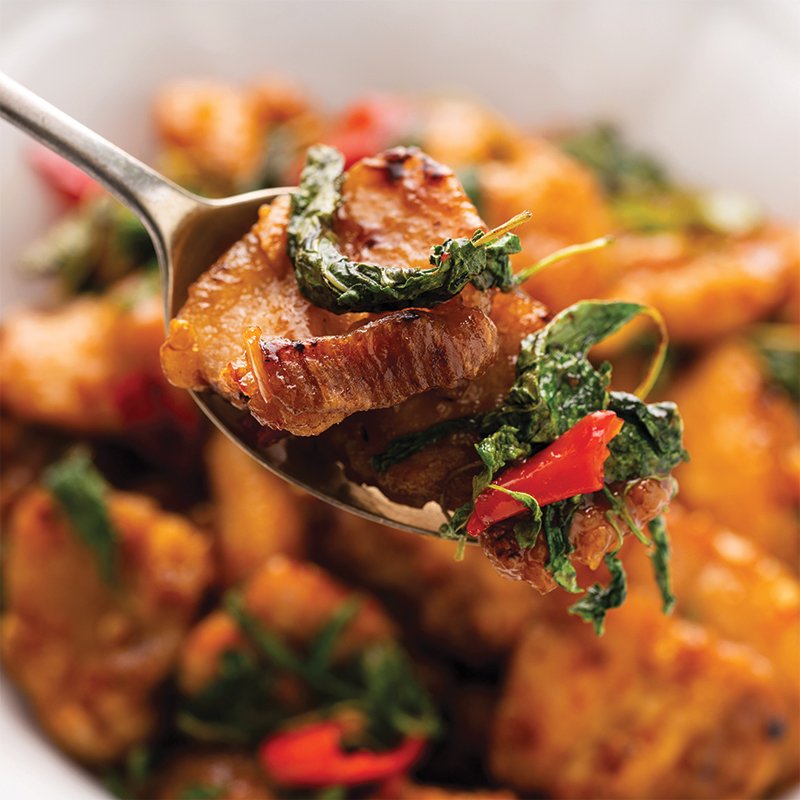 When should you add basil to Thai stir-fries?