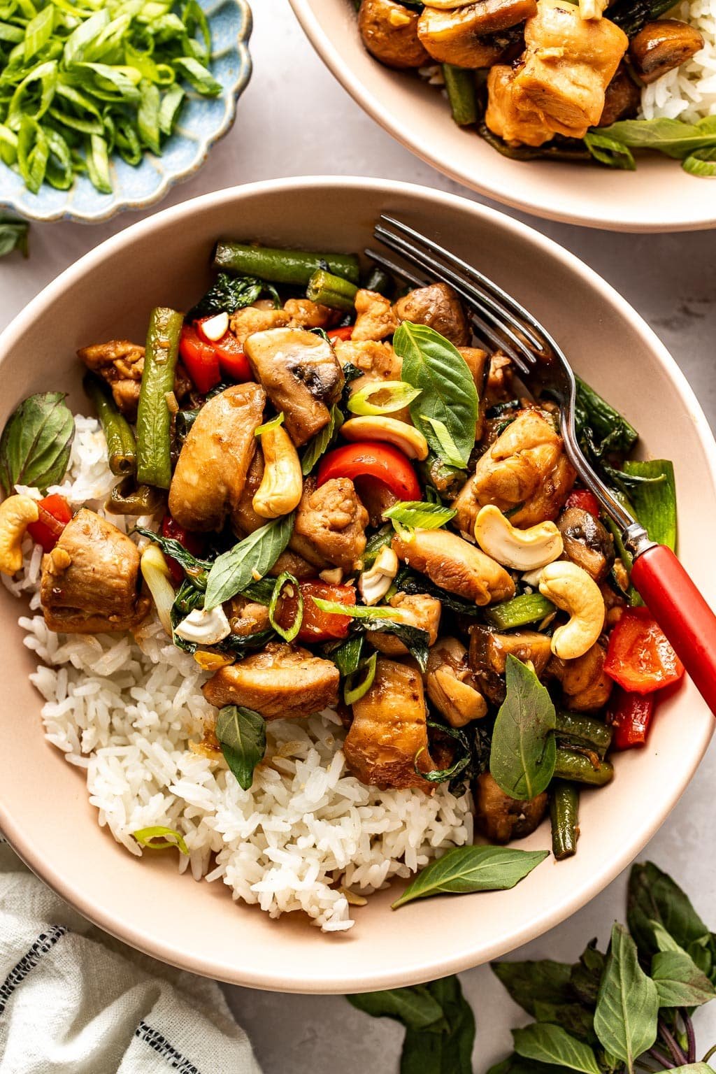 When should you add basil to Thai stir-fries?