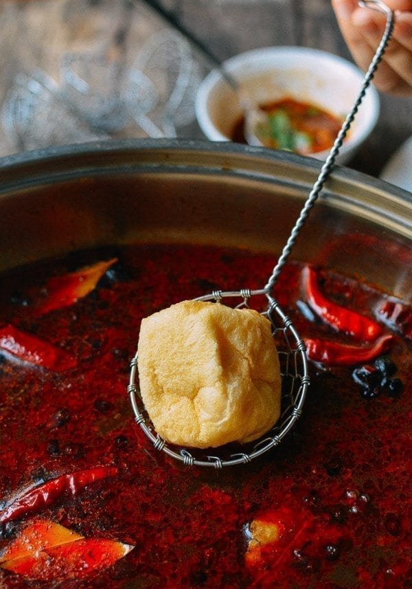 Which ingredients define Sichuan hot pot flavors?