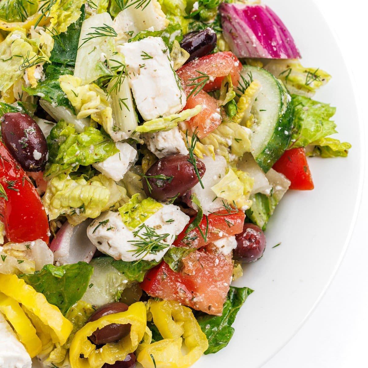 Which ingredients make Greek salad fresh and healthy?