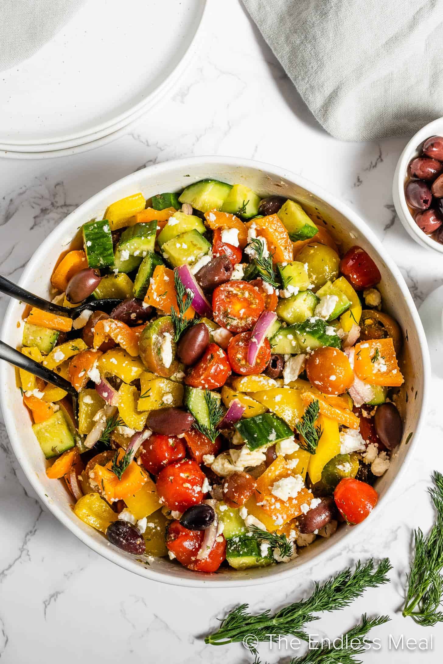 Which ingredients make Greek salad fresh and healthy?