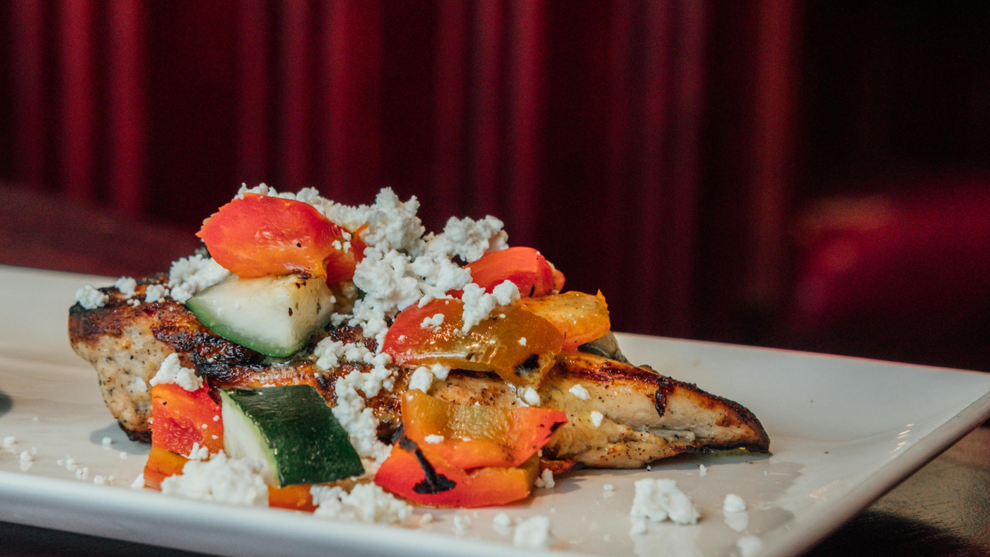 Why do Greek recipes feature feta cheese prominently?